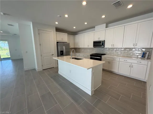 Beautiful kitchen layout with stainless steel appliances