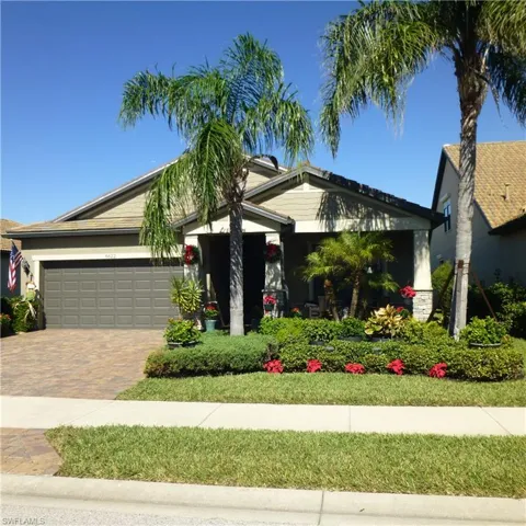 View of front of property featuring a garage