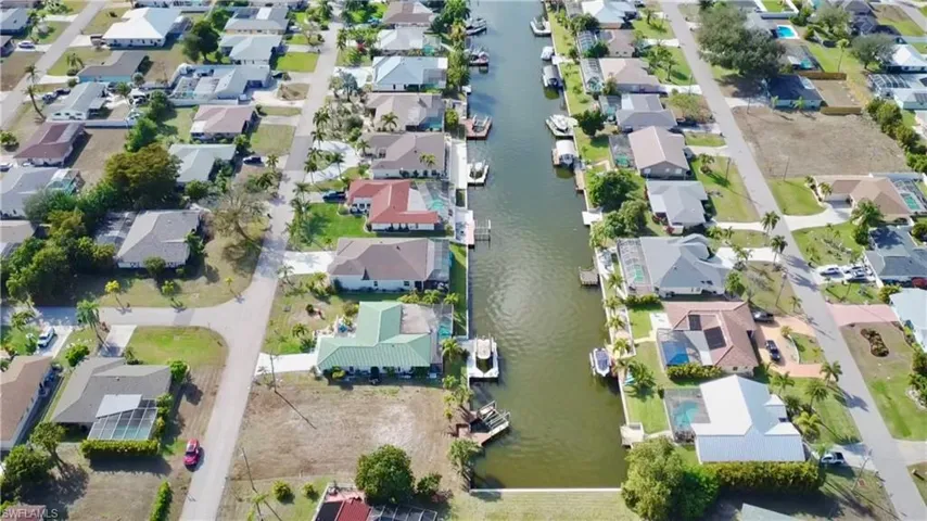 Aerial view of residential area with gulf access canal