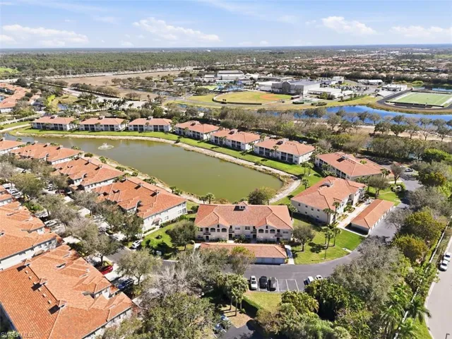 View of property location with nearby suburban area