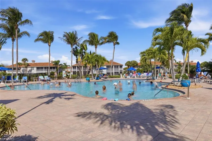 Community pool with a patio area