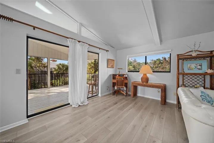 Living area featuring wood finished floors and baseboards