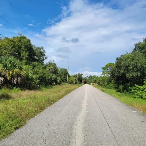Road in front looking West towards Homestead Rd Lot on Left side of street