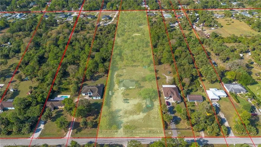 Aerial view of property and surrounding area with property boundaries highlighted
