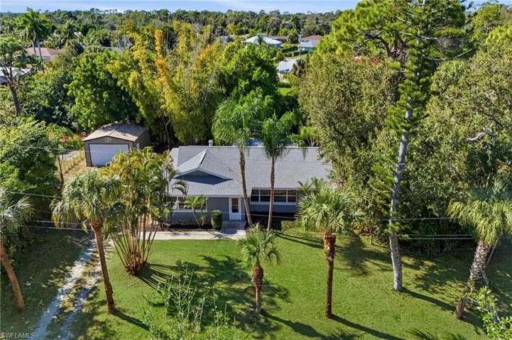 An Aerial View of the Home with Oversized Detatched Garage & mature landscaping for added privacy!