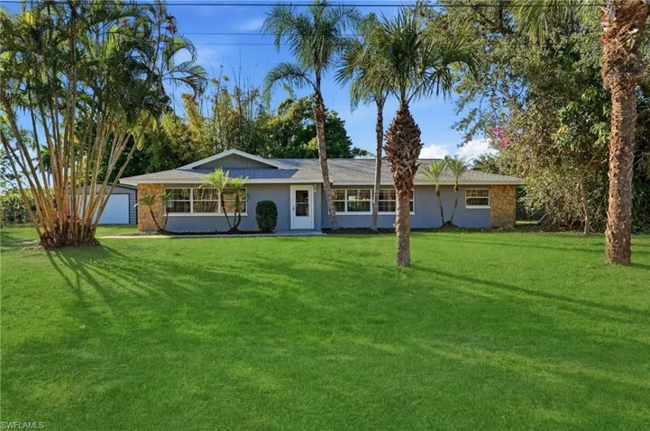 This sprawling Ranch Home sits on a lush .56 acres with Direct Boat access to the Open Waters!