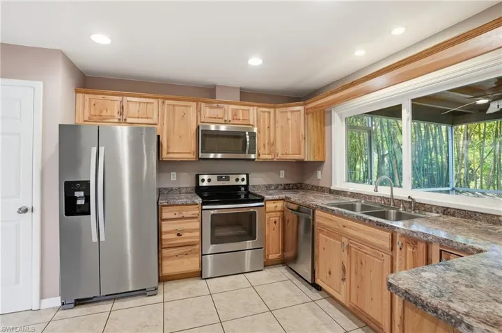 A Gourmet Kitchen that provides plenty of storage and has the BEST water & evening sunset views!