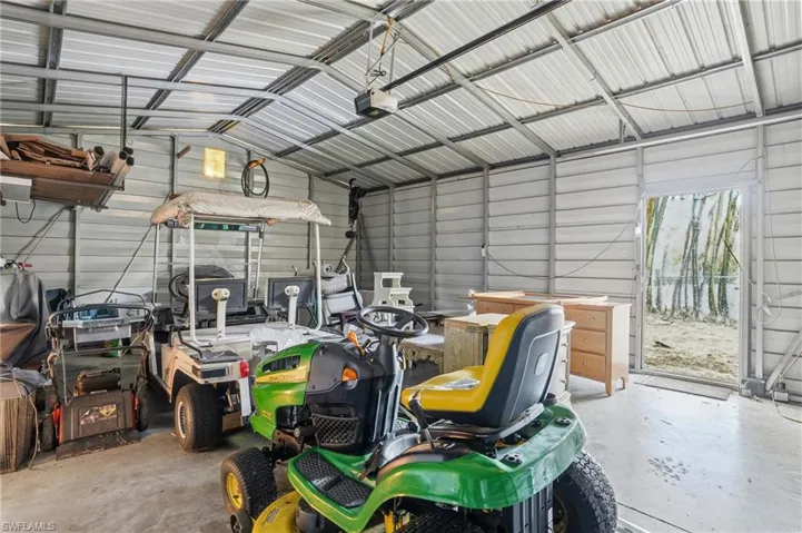 The oversized Detached Garage makes a perfect workspace and will accomodate all your storage needs!