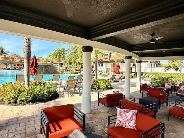 Poolside cabanas offer shaded sitting areas for ultimate relaxation.
