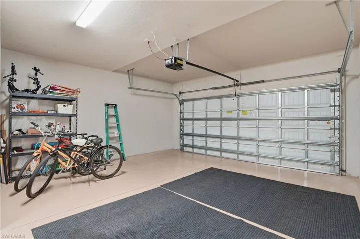 Spacious tandem 3-car garage perfect for cars, bikes, and even a golf cart—oh my!