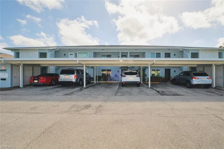 New Roof, New Covered Parking, New Paint!