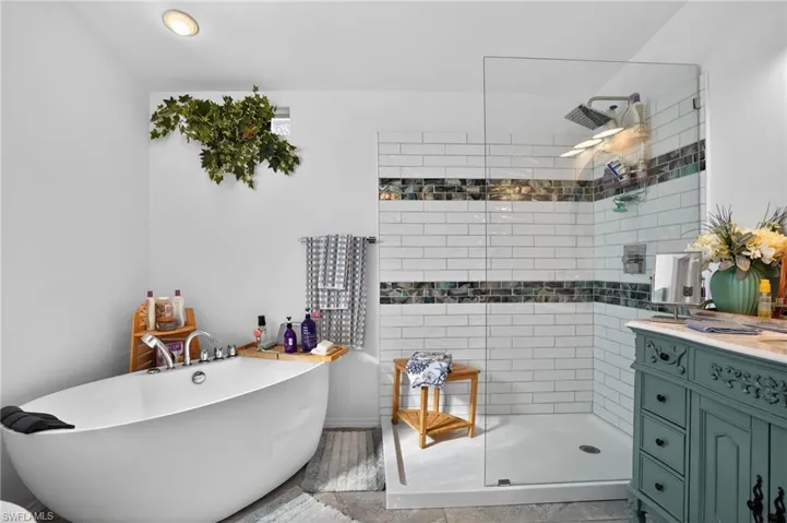 LOTS OF NATURAL LIGHT WITH A WALK-IN SHOWER AND JETTED TUB!