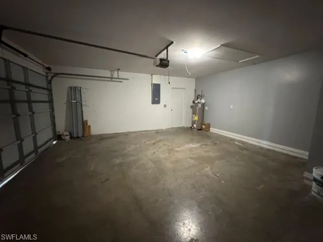 Garage with electric panel and electric water heater