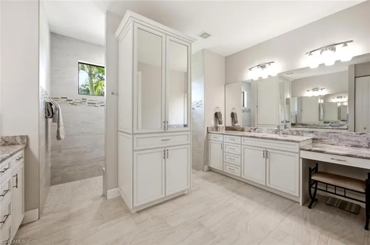 Primary bath with walk in shower & vanity