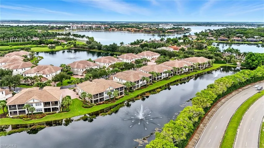 Aerial view of residential area with a nearby body of water