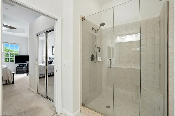 Master Bedroom ensuite bathroom featuring a stall shower and separate tub