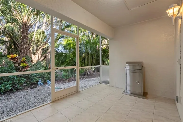 Unfurnished sunroom with plenty of natural light