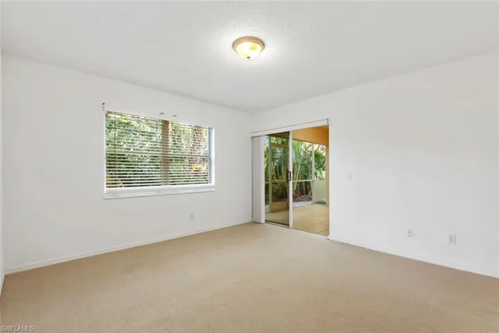 Master bedroom room featuring a textured ceiling