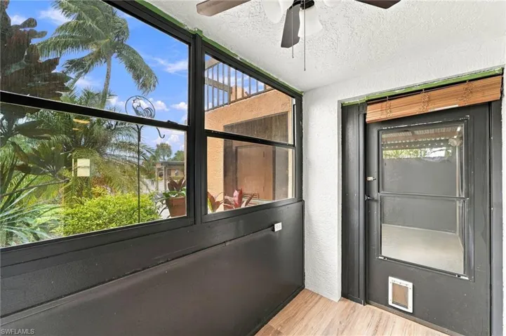 There are a lot of outdoor seating options in this home. Here is the enclosed 9' x 5' front patio