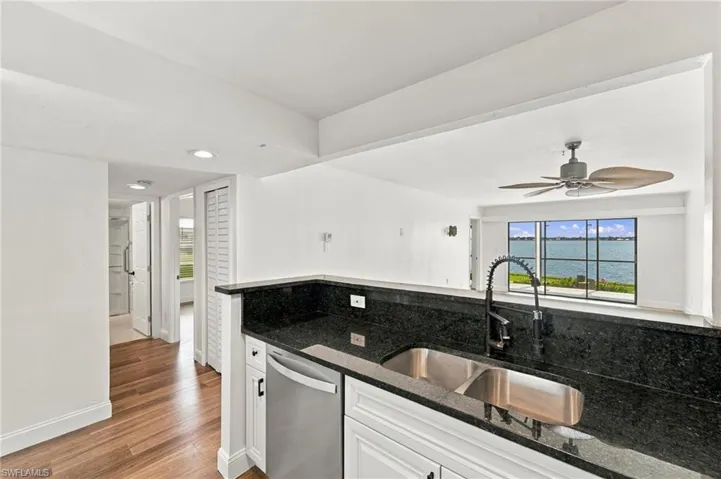 A double sink w/disposal and a high top breakfast bar. The ideal spot for your morning coffee or tea