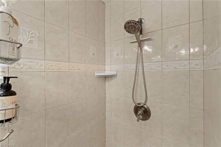 Bathroom featuring a tile shower