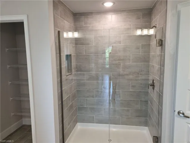 Bathroom with a stall shower