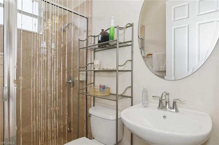 Full bath featuring a stall shower