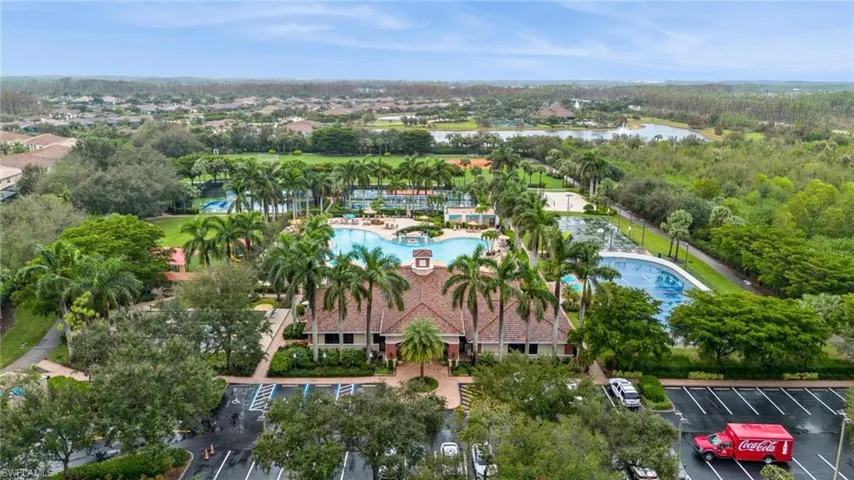 Aerial view of a nearby body of water and a pool