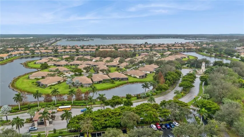 Aerial overview of property's location featuring nearby suburban area and a nearby body of water