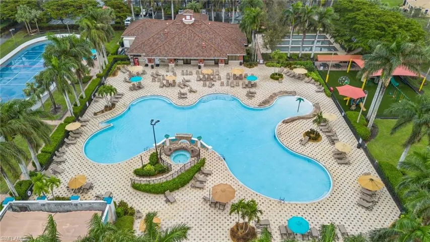 Community pool with a hot tub