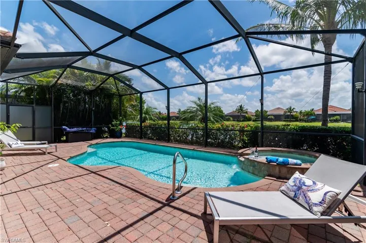 Life is good!  Enjoy the SWFL climate from your pool and watch the sunrise from the large screened-in patio.