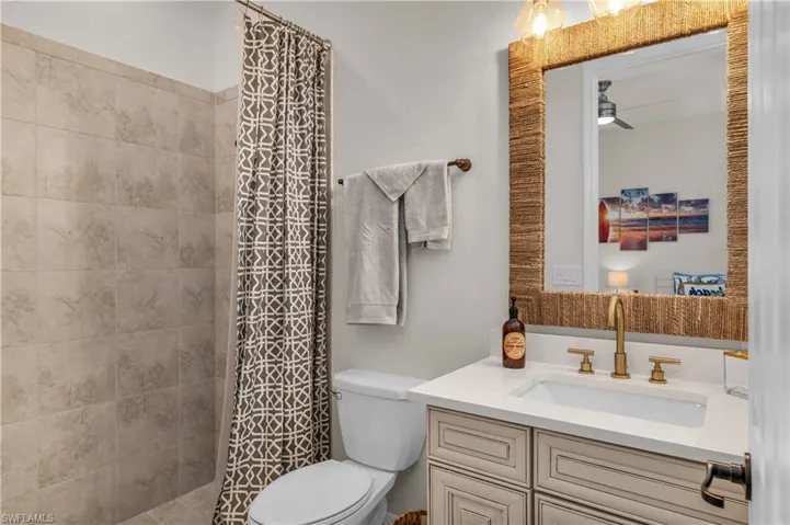 Second Guest room with ensuite bath, walk in shower and new quartz countertops and fixtures.