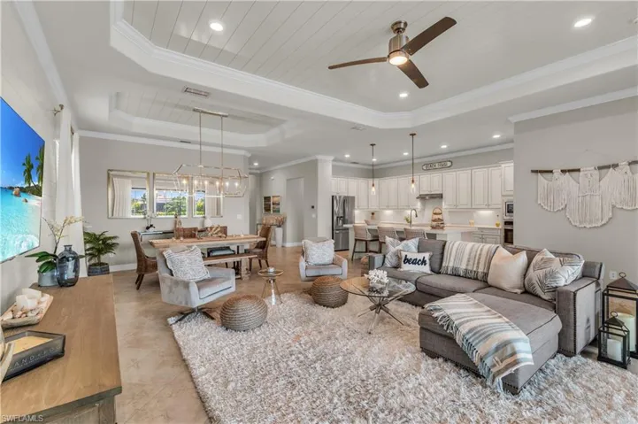 View from lanai into Great Room.  Relax and Reflect in this open floor plan.  High ceilings and tons of lighting...Lives Large!