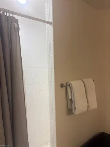 Bathroom with a tile shower