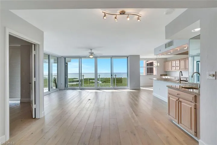 Great Room featuring light wood flooring and fantastic natural lighting
