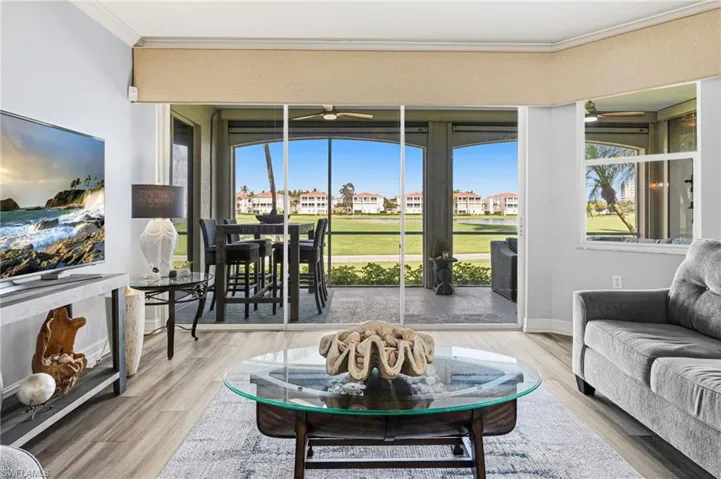 The main living area captures panoramic views of the lake and golf course, while a thoughtfully curated new furniture design enhances the sense of openness and spaciousness.