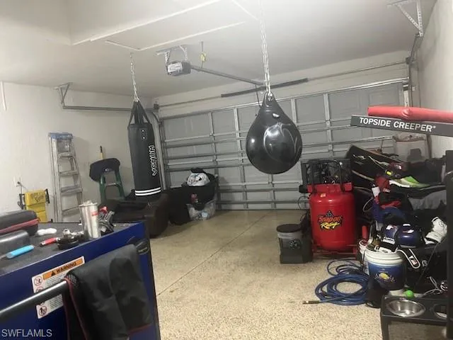 RIGHT SIDE UNIT (1921).  BOTH SIDES HAVE "FINISHED" GARAGE FLOORING