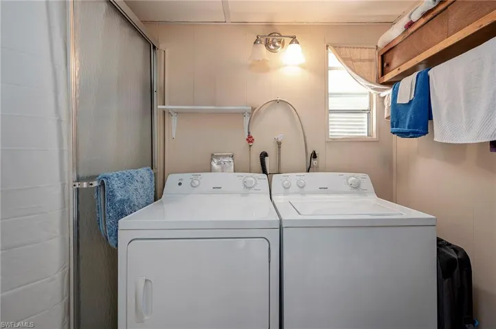 Laundry room featuring washing machine and dryer