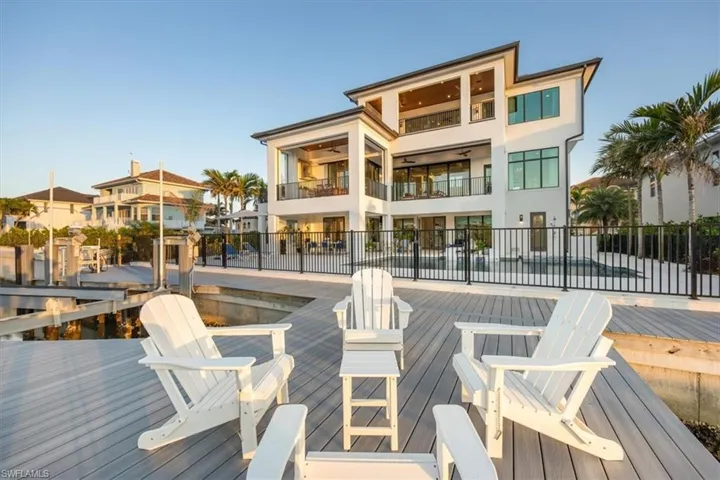 Back of property featuring a balcony