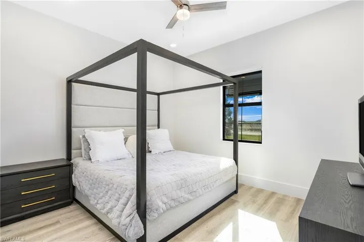 Bedroom featuring light wood-style flooring and ceiling fan
