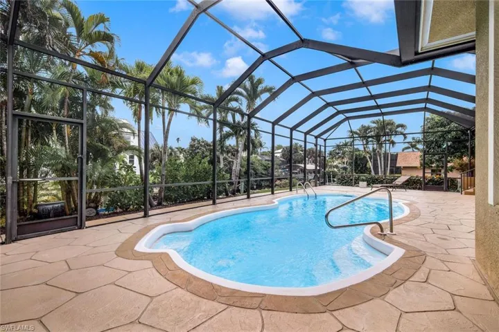 Welcome to your outdoor oasis! This home combines indoor & outdoor living - the perfect space for you to enjoy all that Southwest Florida has to offer!