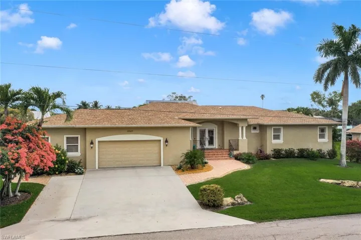 Over 3,000 sq. ft. of gorgeous living space 4 BEDROOM, pool home with canal view!