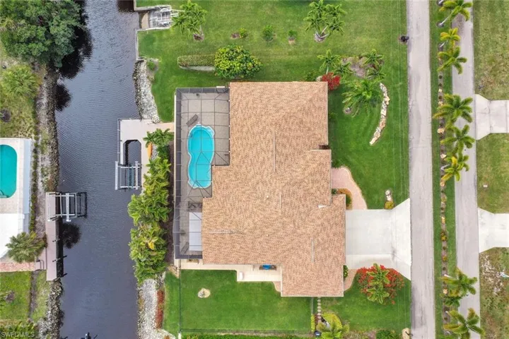 LOOK NO FURTHER! Desirable, GULF ACCESS POOL HOME in the non-gated community of Bonita Farms.