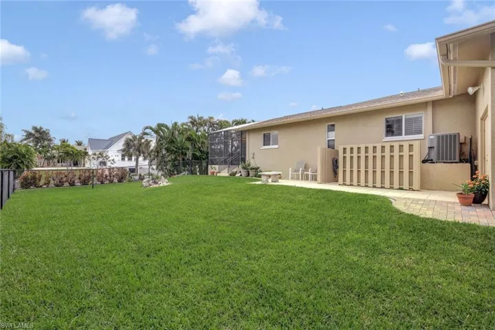 Oversized lot features a large fenced in area to the north side of the home.