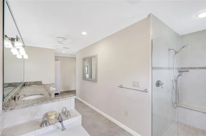 Plenty of room for two in this large primary bathroom.