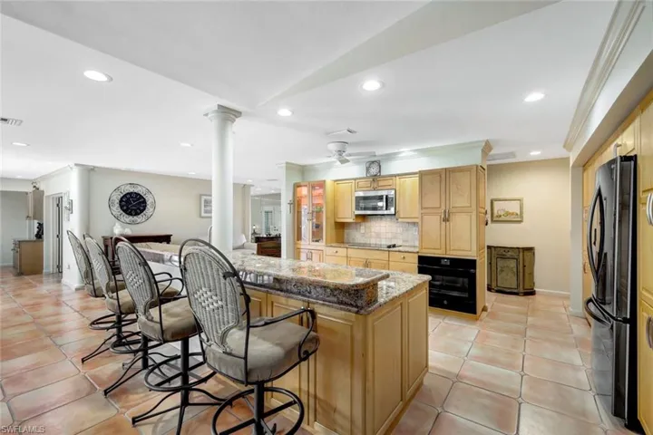 Granite counter-tops, spacious island and stainless steel appliances!