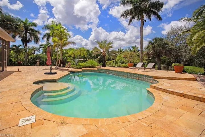 Swimming pool featuring a patio area