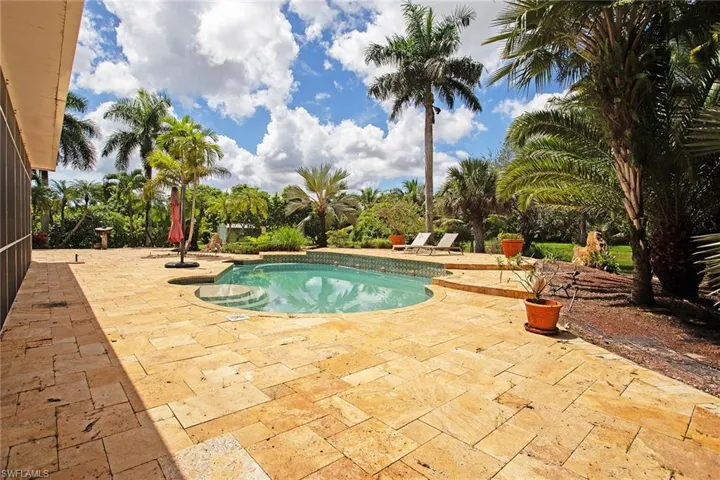 Outdoor pool featuring a patio area