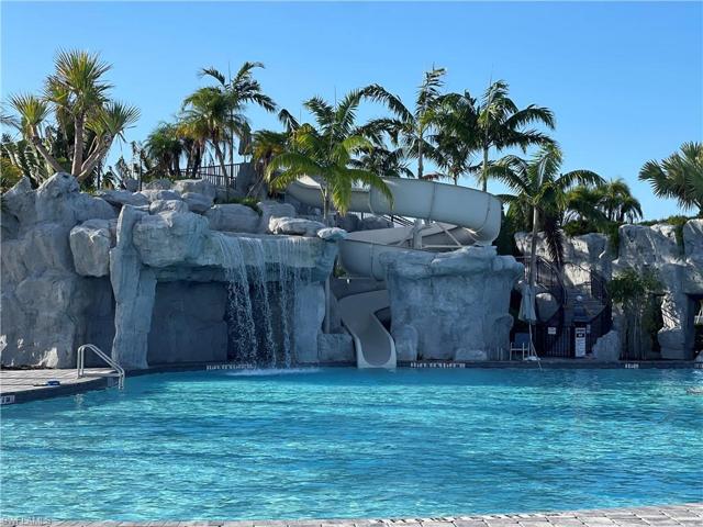Resort pool with slide.