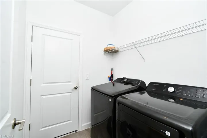 The black washer and dryer are the Seller's. There will be a brand new white washer and gas dryer set (never used) in it's place.